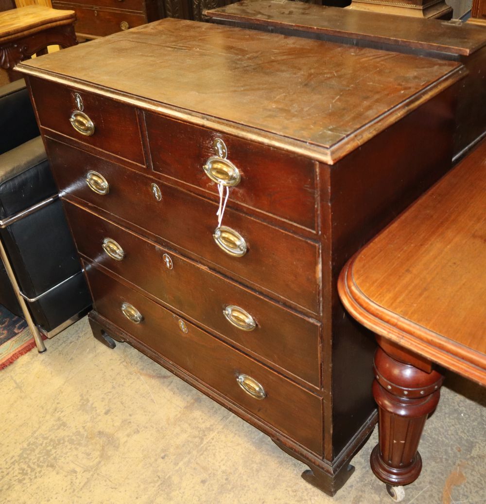 An 18th century oak chest fitted two short drawers and three long drawers with brass handles, on bracket feet, W.98cm, D.52cm, H.95cm